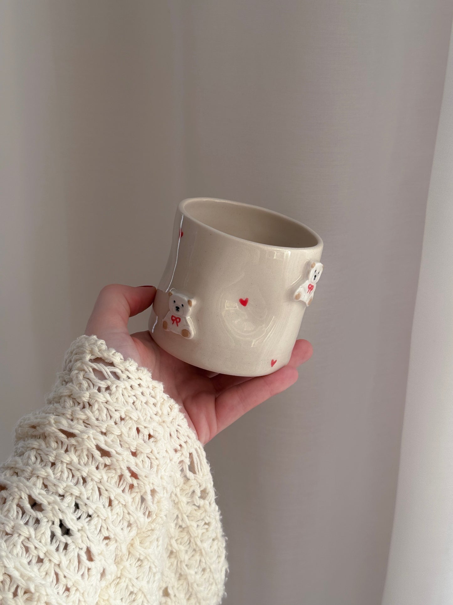 Cup with white teddy bears