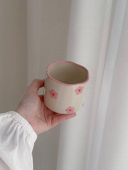 Cup with pink flowers