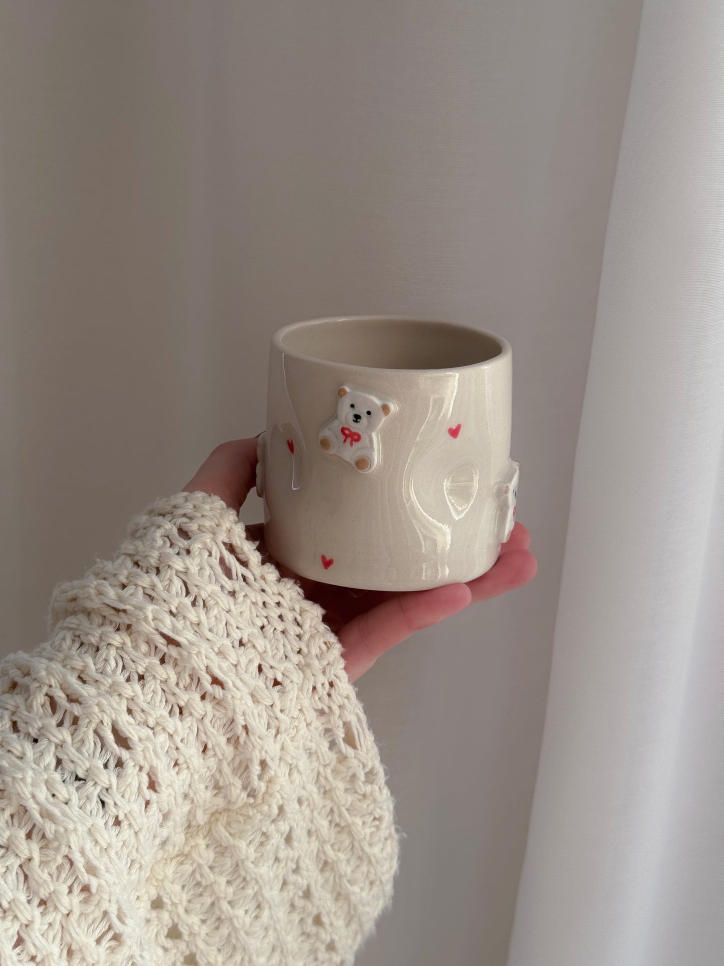 Cup with white teddy bears