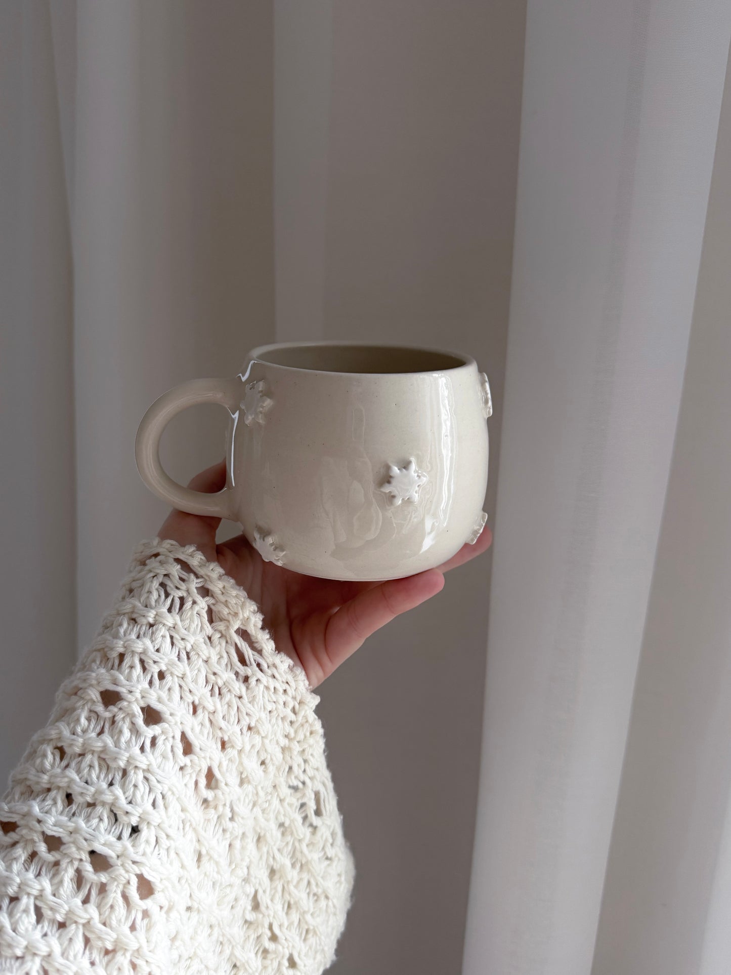 Mug with white snowflakes