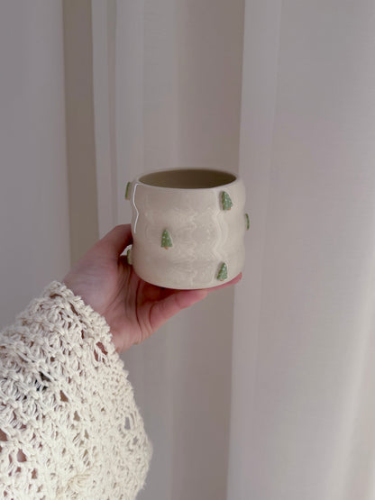 Cup with Christmas trees