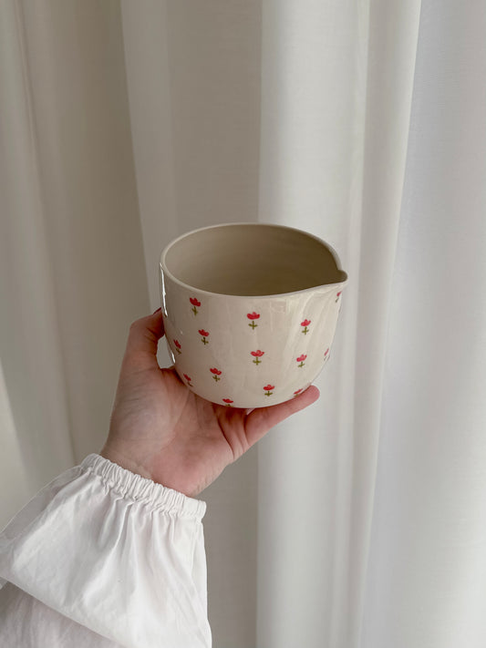 Matcha bowl with red tulips