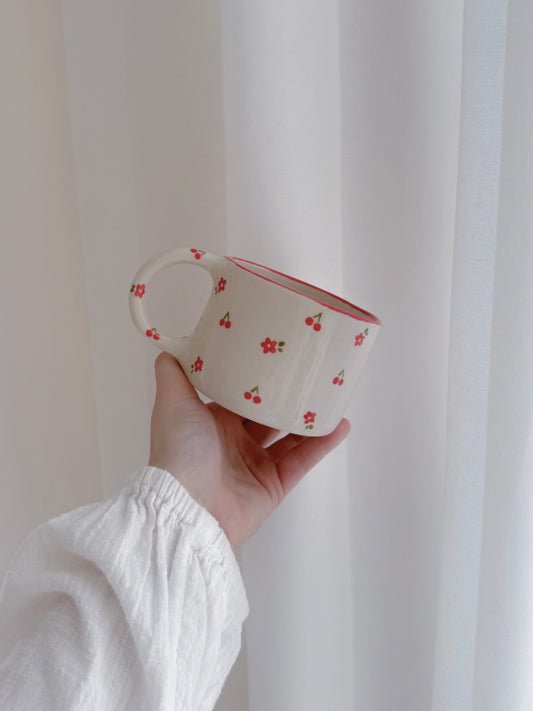 Mug with cherries and red flowers