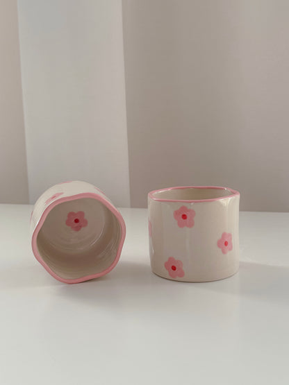 Cup with pink flowers