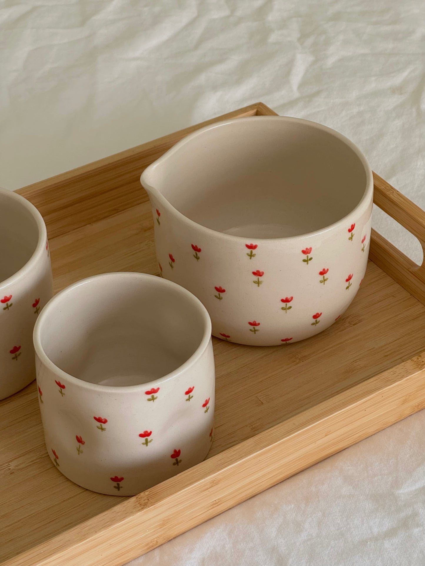 Matcha bowl with red tulips